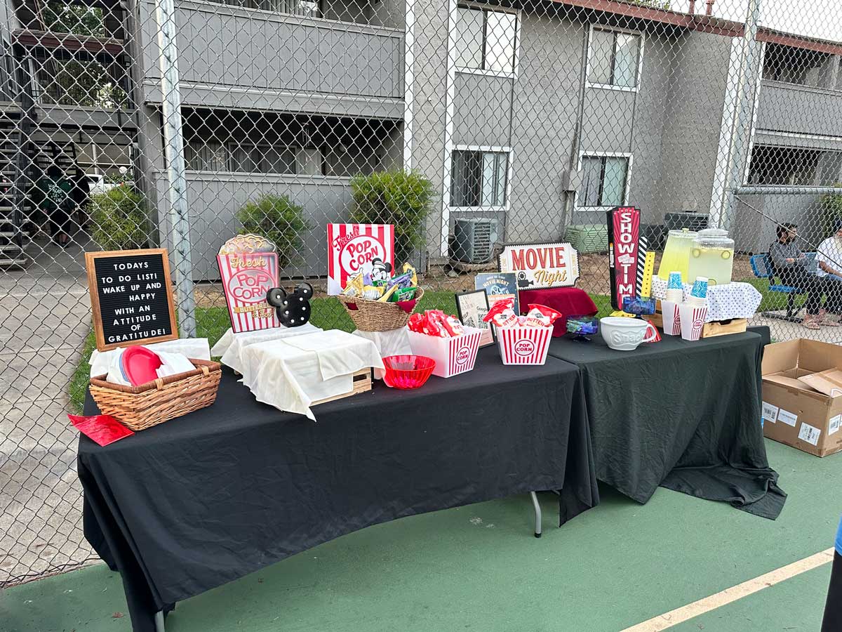 Decorated table with snacks and signs